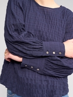 Knewe Label Volume Top